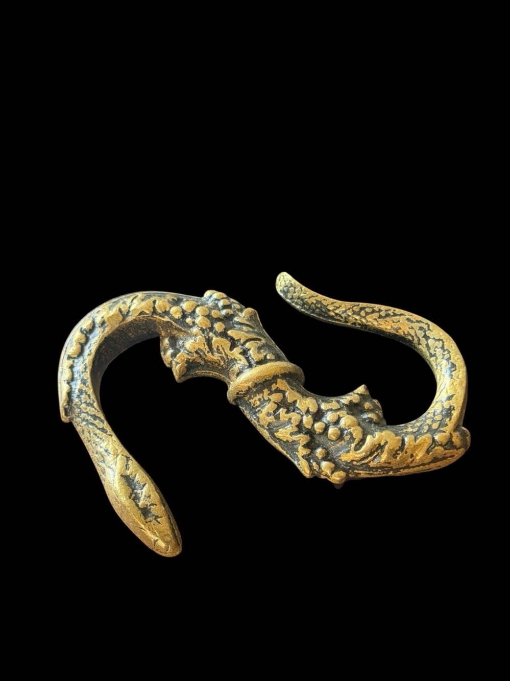 Antique S-Curve Belt Buckle featuring an ornate, textured serpentine body